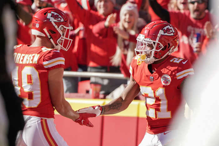 Dec 12, 2021; Kansas City, Missouri, USA; Kansas City Chiefs cornerback Mike Hughes (21) celebrates with safety Daniel Sorensen (49) after scoring against the Las Vegas Raiders during the first half at GEHA Field at Arrowhead Stadium. Mandatory Credit: Denny Medley-USA TODAY Sports